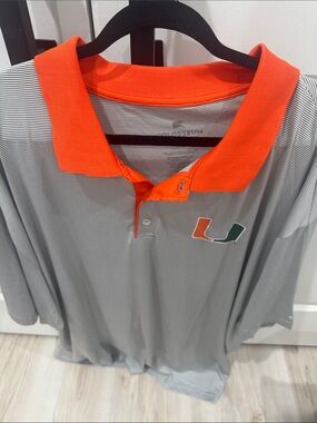 Colosseum Grey Polo with Bright Orange Collar and U Logo